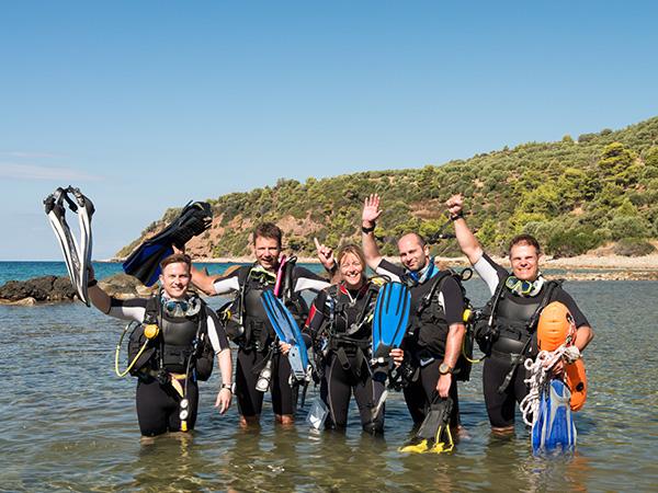 group of scuba divers learning overseas 