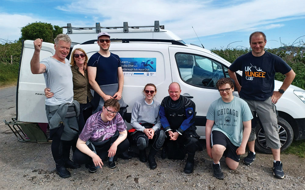 Craig Cameron (kneeling centre) with newly qualified Sports Divers