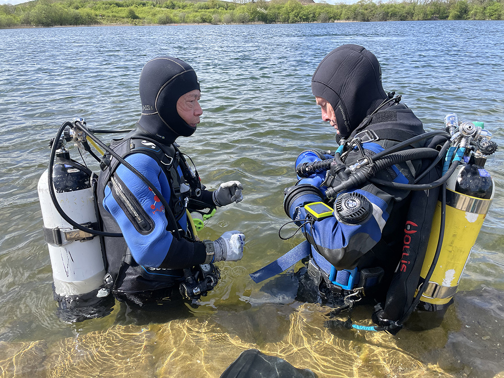 Divers in open water