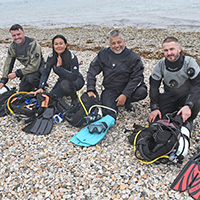 Simon Rogerson - divers on beach